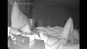 A Timid Girl Indulges In Self-Pleasure Before Bed, Captured By A Hidden Camera
