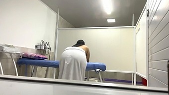 Ample Patient With Oiled Buttocks Captured During Office Visit